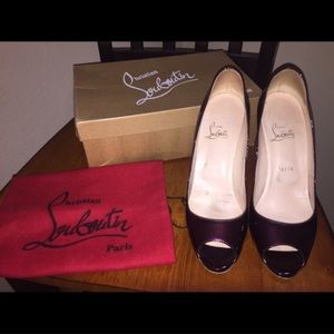 Authentic Christian Louboutin. Oxblood color. Peep toe.